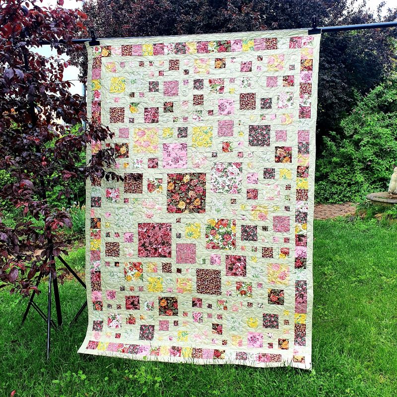 Game with roses quilt